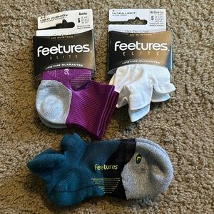 Feetures elite socks size small. 3 pairs